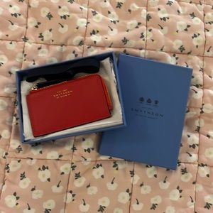 Smythson card wallet in bright red. In box, never used.